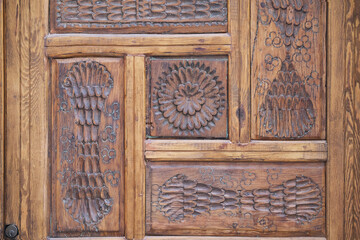 Wooden ornament on door surface