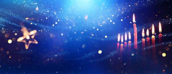 Image of jewish holiday Hanukkah with menorah (traditional candelabra) and candles