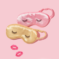 Creative layout with two sleep masks with false eyelashes and kiss prints on pastel pink background. 80s or 90s retro fashion aesthetic concept. Minimal romantic cosmetic beauty Valentines day idea.