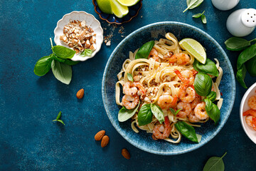Pasta with shrimp and basil, noodle with shrimp, top view - obrazy, fototapety, plakaty