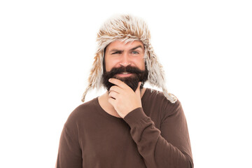 funny brutal hipster with beard in earflape hat isolated on white background, fashion