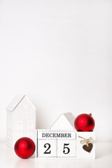 Christmas Vintage Wood Calendar with red ornaments and date december 25. Vertical banner with place for text