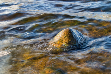 waves splashing on rock