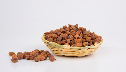 Black Chickpeas or Kala Chana with chana dal pulse isolated on wooden Background.
