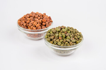 Black Chickpeas or Kala Chana with chana dal pulse isolated on wooden Background.