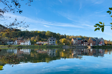 View of the historic town of Dinant with scenic River Meuse in Belgium