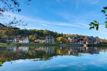 View of the historic town of Dinant with scenic River Meuse in Belgium