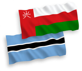 Flags of Sultanate of Oman and Botswana on a white background