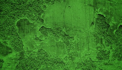 old wall background with greenery theme, peeling wall surface in the form of abstract art, green color background concept with cracked and broken old wall material