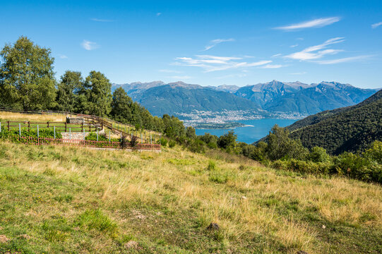 Aerial view of Locarno and the Swiss Alps from an alpine pasture