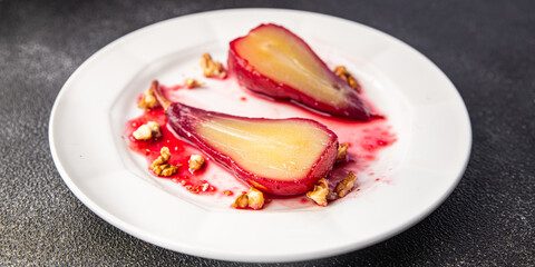 pear in red wine sweet dessert french cuisine healthy meal food snack on the table copy space food background top