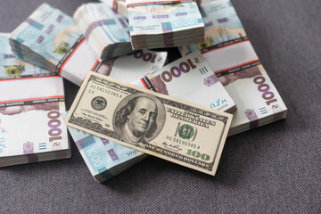 Background made of dollar and hryvnia banknotes