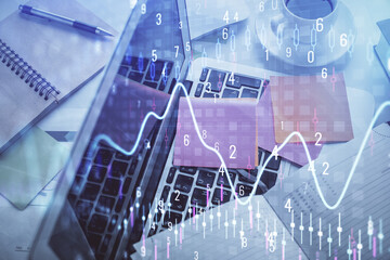 Multi exposure of financial chart drawing over table background with computer. Concept of research and analysis. Top view.