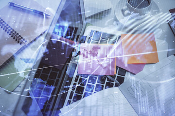 Multi exposure of financial chart drawing over table background with computer. Concept of research and analysis. Top view.