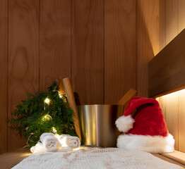 Obraz na płótnie Canvas sauna accessories in the steam room. Christmas and new year, holiday vibes. Copy space