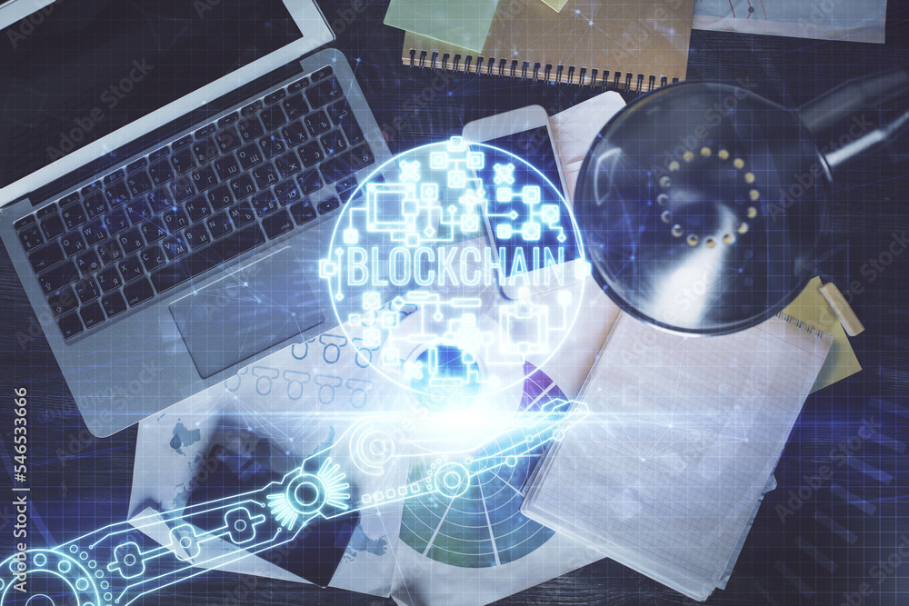 Poster blockchain theme hologram drawings over computer on the desktop background. top view. double exposur