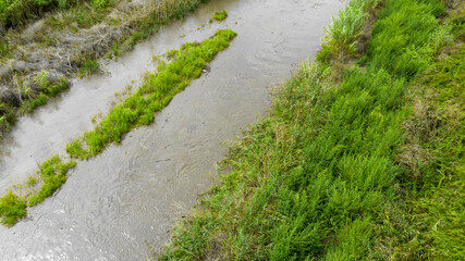 Obraz premium Aerial view of a small river