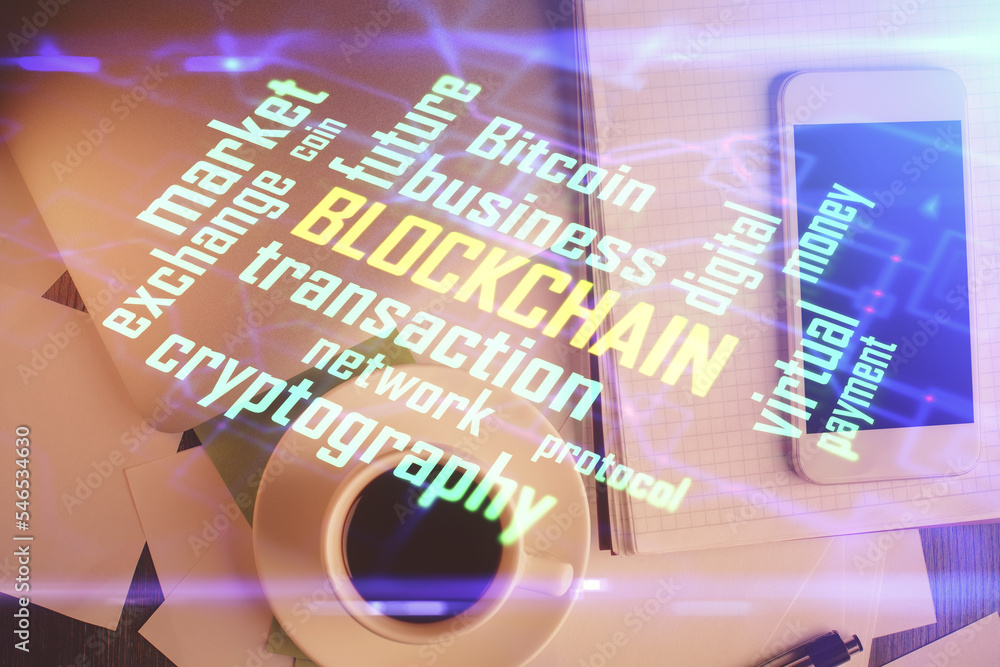 Poster double exposure of blockchain theme hologram over table with phone. top view. crypto technology conc