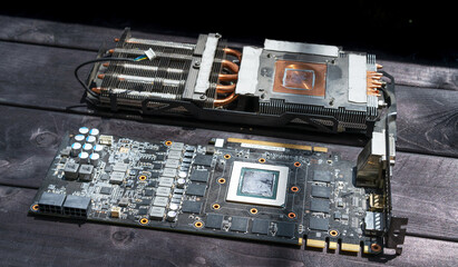 Disassembled video card on wooden background