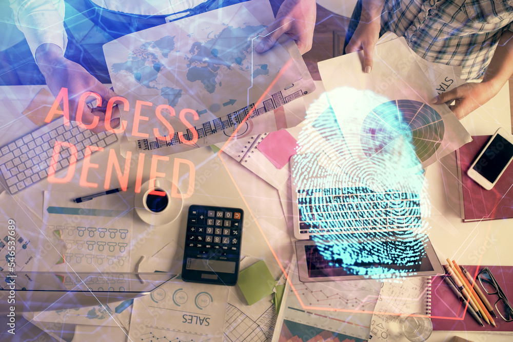 Poster double exposure of man and woman working together and fingerprint drawing. computer background. top 