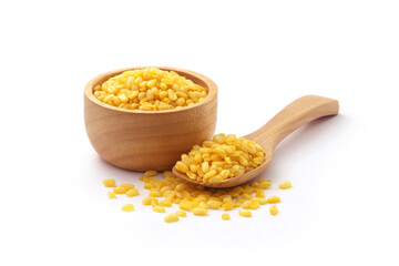 Fried mung bean in wooden bowl and spoon isolated on  white background.