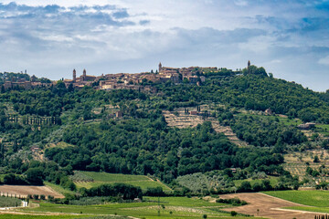 Italian landscape along via Francigena, between Ponte d'Arbia and San Quirico d'Orcia, Tuscany, June 2022