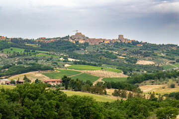 Fototapeta na wymiar Italian landscape along via Francigena, between San Quirico d'Orcia and Radicofani, Tuscany, June 2022