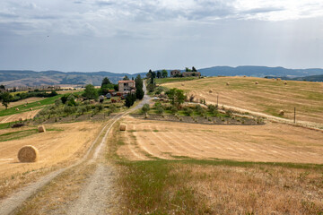 Italian landscape along via Francigena, between San Quirico d'Orcia and Radicofani, Tuscany, June...