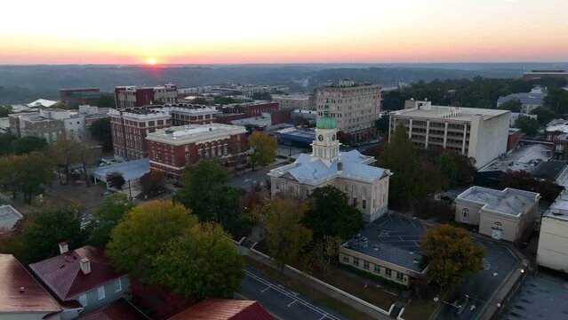 Downtown Athens Georgia aerial establishing shot of town at sunrise. City town hall near University of Georgia.