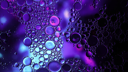 Abstract Colorful Food Oil Drops Bubbles and spheres Flowing on Water Surface