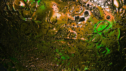 Abstract Colorful Food Oil Drops Bubbles and spheres Flowing on Water Surface