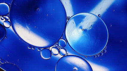 Abstract Colorful Food Oil Drops Bubbles and spheres Flowing on Water Surface