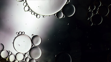 Abstract Colorful Food Oil Drops Bubbles and spheres Flowing on Water Surface