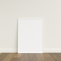 Empty picture frame on wooden floor leaning against wall. Blank poster frame standing on wooden floor. Blank poster frame mockup. Empty picture frame mockup. 3d rendering.