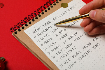 Concept of New Year Resolutions list, new year goals, close up