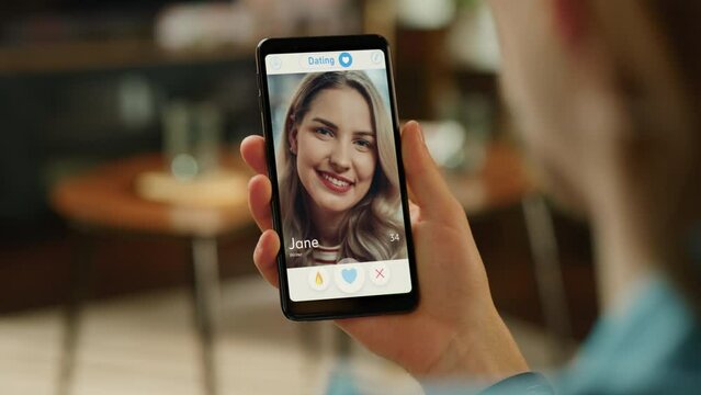 POV Dating App Concept: Person Uses Smartphone for Browsing Social Media Dating Application. Person Swiping, Searching, Screen Shows Matching with Partner, Finding True Love