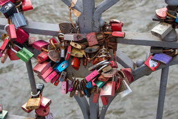 Pictures of love locks on a bridge in Hamburg's warehouse district
