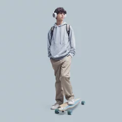 Afwasbaar fotobehang Teenager posing with a skateboard © stokkete