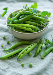 Bowl with sweet pea pods