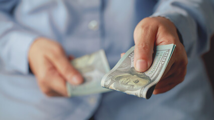 dollar money businessman catching cash .Business finance dollar concept close up of hands counting...