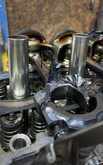 Close-up of huge metal or steel shaving on a broken car engine. Detail of damaged automobile motor....