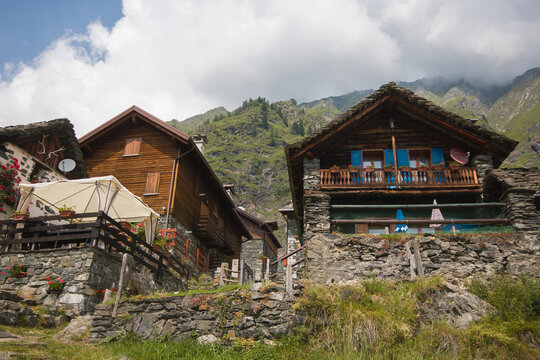 View of traditional alpine house in the Cheggio little village during summer season Italy