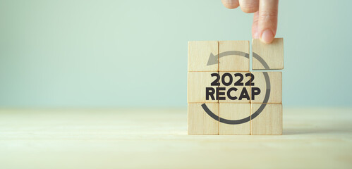 2022 Recap economy, business, financial concept. For business planning. RECAP word icon on wooden cubes on smart grey background and copy space.. - obrazy, fototapety, plakaty