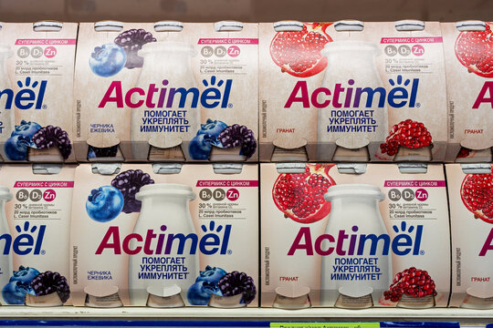 Actimel probiotic yogurt on shelf at supermarket.. Actimel, also known as DanActive, is a 'probiotic' yogurt-type drink produced by the French company Danone. Minsk, Belarus, 2022