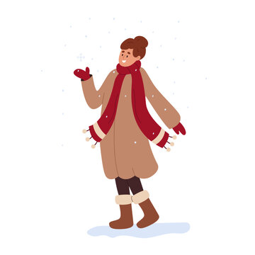 Happy smiling girl enjoying winter weather. Young woman wearing warm coat, scarf, mittens, boots. Female character rejoices in snowfall. Flat cartoon vector illustration
