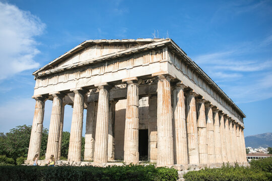 Temple of Hephaestus in Athens, Greece. Sunny view of Ancient Greek ruins in the Athens center. The Famous Hephaistos temple on the Agora in Athens, the capital of Greece.