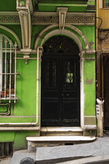 Old wooden entrance door of house in Istanbul.