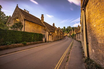 Castle Combe - May 28 2022: Old Cotswolds town of Castle Combe, England.
