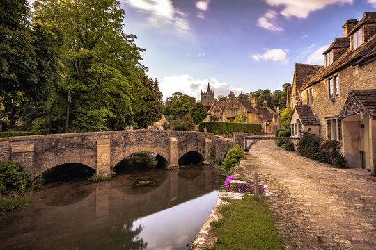 Castle Combe - May 28 2022: Old Cotswolds town of Castle Combe, England.