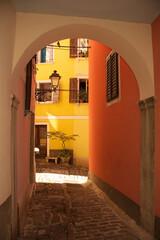 A quiet backstreet in the historic medieval centre of Piran on the coast of Slovenia
